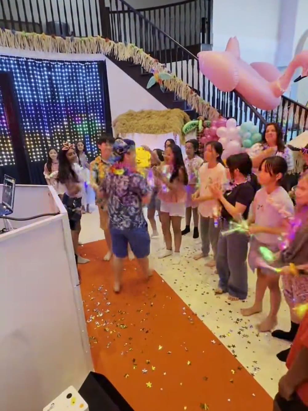 Kids lining a confetti covered carpet at a Vancouver boys birthday party.